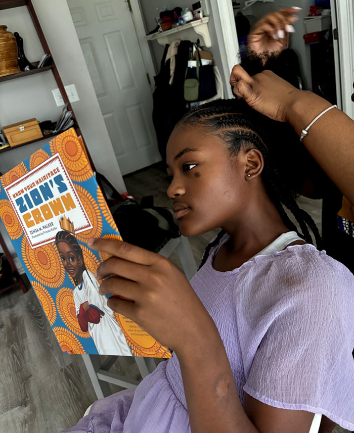 African American girls holding up Zara's Wash Day book photo image